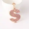 Chaveiro de Carro Europeu e Americano Transfronteiriço com Pedras de Diamante em Formato de Dólar