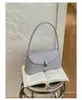 Bolsa de comércio exterior transfronteiriça da fábrica de origem, bolsa de ombro feminina de novo estilo, elegante e versátil, adequada para o trabalho, bolsa de mão