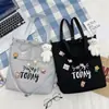 Nova Bolsa de Lona Feminina Estudante Estilo Coreano Alto Valor Estilo Preguiçoso Campus Livros Grande Capacidade Ombro Transversal Bolsa Tote