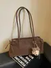 Bolso de Axila de Moda para Viajes Diarios para Mujer 2026 Modelo Nuevo Bolso de Hombro y Axila Simple Versátil Bolso de Mano de Nicho con Textura