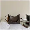 Bolso para mujer con diseño de nicho súper popular, nuevo modelo 2026, bolso tote para el hombro para el día a día con un toque de alta gama, bolso cruzado de un solo hombro