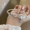 Pulseira de Bambu com Flor de Borboleta Estilo Novo para Mulheres, Estilo Jovem, Sólida com Design de Lótus e Flor de Ameixa Pendurados, Pulseira de Empurrar e Puxar, Pulseira de Pulso de Bambu