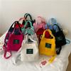 Bolso de mujer nuevo estilo coreano, bolso de lona sencillo y artístico para chica, bolso de cubo de moda de color sólido fresco, bolso cruzado informal moderno
