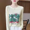 Nueva camiseta de punto casual de otoño para mujer con estampado de letras de dibujos animados, manga larga, cuello redondo, corte holgado, top fino y adelgazante