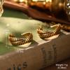 Estilo de corte europeo y americano oro ruso nicho nuevos aretes medievales borla perla diseño ojo de tigre aretes de alta gama
