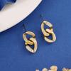 Pendientes con diseño de nicho Dongdaemun con costuras geométricas para mujer, venta al por mayor, con aros entrelazados, de estilo europeo y americano.