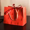 Bolsa de regalo con patrón de pino estilo bosque, bolsa de mano de lujo con lazo color verde olivo, bolsa de papel para empaque de recuerdos de fiesta de Navidad, en stock
