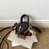 Superficie de Espejo Moda de Primavera 2026 Elegante con Estilo Mini Personalidad Sencilla Versátil Bolso tipo Concha de Hombro Cruzado de Mano