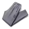 Pantalones de chándal para hombre Primavera y Otoño Nuevos Bolsillo con Cremallera Pantalones Antirrobo Delgados Rectos Sueltos Versátiles Joggers
