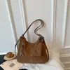 2026 Mochila Nueva de Gran Capacidad Pequeña Múltiples Bolsillos Traseros Diseño Hermoso Elegante Versátil Casual Bolso de Hombro