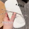 Populares en Xiaohongshu, montura de titanio ultraligera sin montura para mujer 20207, pura y delicada, que estiliza el rostro, venta al por mayor de fábrica, lentes con forma de mariposa