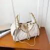 Bolsa de mano estilo pequeño aroma de rombos transfronteriza nuevo estilo cubo bolsa de axila bolso de hombro único sensación de alta gama bolso cruzado de cadena