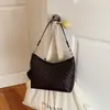 Bolso de mano tejido de color sólido nuevo 2026 transfronterizo para mujer, bolso de hombro cruzado simple, bolso de mano de moda para el trabajo