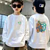Blusa de Manga Comprida Infantil de Algodão Puro Estampada com Desenhos para Primavera e Outono Meninos Nova Fofa para Crianças Pequenas e Médias Camiseta Versátil de Segunda Pele Tendência