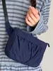Bolsa de Tela Gran Capacidad Bolsa para Empanadas Bolso Cruzado Primavera 2026 Nuevo Color Sólido Casual Ligero Estilo Deportivo Bolso de Hombro de Moda