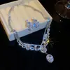 Collar con pendientes de diamantes y gotas de agua transfronterizas europeas y americanas, colgante de lujo ligero, cadena de clavícula, joyería de alta gama para celebridades de Internet para mujeres.
