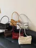 Moda transfronteriza simple para el día a día 2026 verano nuevo bolso de mano con lazo bolso de hombro bolso personalizado bolso de axila
