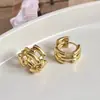 Estilo de Moda Coreano y Japonés Diseño de Línea Circular Entrelazada Incrustación Completa de Circonita Personalizables Desmontables Múltiples Formas de Usar Pendientes Ligeros de Lujo para Mujer