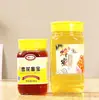 Botella de Vidrio Personalizada para Miel Botella para Pepinillos Botella de Miel Paquete de 0.5 kg Paquete de 1.0 kg Botella de Vidrio Octagonal Grande y Pequeña para Miel