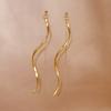Pendientes pequeños con borlas largas y sencillas de acero inoxidable y titanio, elegantes y modernos, estilo frío, con ondas en forma de S para mujer.