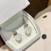 Pendientes de tachuela curvados con patrón de espiral de plata de ley 925 completa y cristal blanco natural para mujer, moda de verano fresca de nicho