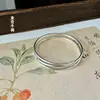 Novo bracelete Dongjin de laço duplo para mulheres, design de nicho, pulseira deslizante ajustável, moderna, versátil, luxo discreto, de alta qualidade