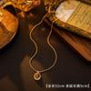 Collar Ainibini serie Maillard en oro de 18 quilates con piedra de ojo de tigre, estilo retro europeo y americano, cadena de clavícula de lujo con luz de caramelo.