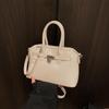 Comercio Exterior Super Caliente Bolsa Pequeña Mujer Primavera y Verano 2025 Nuevo Bolso Bandolera de Hombro Versátil Casual Nicho Portátil Bolso Kelly