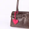 Colgante de Bolsa Casual de Cuero PU Corazón de Melocotón Corazón Relleno de Algodón Cuero Regalo de Pareja Colgante de Llavero Fábrica Venta al por Mayor