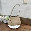 Bolso de mano tejido de alta gama transfronterizo, nuevo popular versátil para madre e hija de principios de otoño 2026, bolso de hombro