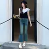 Pantalones Acampanados Cortos de Mezclilla Azul Vintage para Mujer con Dobladillo Deshilachado, Azul Negro Nostálgico, Color Té con Leche, Blanco Crudo, Estampado Yichun