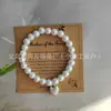 Pulseira de Pérolas de Alto Brilho com Cordão Elástico Trançado Ajustável Presente Dia das Mães Pulseira com Pingente de Coração de Pérola Branca 8mm