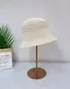 2026 Nuevo Estilo Tejido Hueco Suave Transpirable Protección Solar Ala Pequeña Sombrero de Pescador Estilo Bosque Sencillo Modifica la Parte Superior del Cráneo Aumenta la Altura