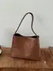 Nova bolsa feminina de comércio exterior, bolsa de balde retrô estilo coreano de grande capacidade para o dia a dia, bolsa de ombro de nicho elegante e versátil, bolsa de ombro da moda.
