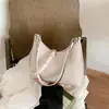 Textura de tejido cruzado axila bolsa nueva mujer 2025 nueva tendencia moda versátil bandolera bolso de mano de un solo hombro