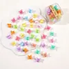 Al por mayor versión coreana de color caramelo dibujos animados clip flor pequeña estrella de cinco puntas pasador de princesa pinza de garra pasador femenino joya en caja