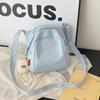 Bolsa de Peito Leve em Nylon 2026 Estilo Novo Tendência Bolsa Concha Versátil em Lona Casual para Ombro Transversal para Mulheres