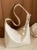 Bolso retro para mujer Shuai Mi Jia 2026 verano nuevo color liso bandolera de un solo hombro bolso de axila bolso de mano casual para commuting para mujer