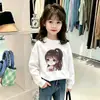 Camiseta básica para niñas, nuevo estilo coreano otoño 2026, camiseta de manga larga con estampado de dibujos animados, top de moda de algodón puro para niños mayores