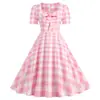 X comércio exterior transfronteiriço fonte de vestuário feminino estilo Hepburn gola quadrada manga curta laço barra ampla poá vestido vintage anos 1950