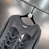 Otoño Temprano 2025 Nuevo Cuello Redondo Manga Larga Diseño de Agujeros Calados Nicho Holgado Aspecto Adelgazante Tejido
