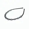Base negra de hierro onda espiral aro deportivo para la cabeza hebilla para el pelo horquilla fina de baño universal para hombres y niñas aro para lavarse el pelo al por mayor
