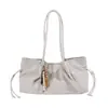 Bolso de hombro de color liso y moderno para mujer, adecuado para el uso diario, un bolso tote simple y elegante, un bolso cruzado ligero y lujoso, y un bolso elegante para el antebrazo para mujer