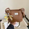 2026 Nuevo Bolso Cubo Casual Versátil de Diseño de Nicho Bolso Popular de Moda para Mujer para Viajar al Trabajo de Hombro Único Cruzado