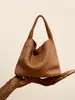 Bolsas de palha tecidas à mão para mulheres, bolsas de mão e de ombro casuais da moda, bolsas de axila estilo coreano de grande capacidade para mãe e filha, vendas diretas de fábrica