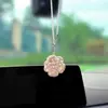Colgante de coche de camelia incrustada de diamantes transfronterizo, adorno decorativo creativo y deslumbrante de flor de rosa de diamante para espejo retrovisor interior