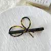 Pinza para el pelo de temperamento simple clip para flequillo biselado clip de pico de pato hueco de alto sentido clip superior tocado al por mayor