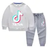 Conjunto de Ropa Infantil Nuevo para Primavera y Otoño 2026 Tiktok: Conjunto de Dos Piezas para Niños: Sudadera y Pantalón Largo, Atuendo de Manga Larga 100% Algodón
