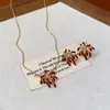 Juego de Joyería de Fuegos Artificiales Chapado en Oro Real de 18K con Circonitas, Pendientes y Collar de Moda y Exquisitos, Joyería de Lujo Ligero y de Alta Gama para Mujeres