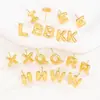 Pendientes de letras de burbuja lisas con baño de cobre y oro real transfronterizos, moda, temperamento, Joker, nuevos pendientes exquisitos, venta al por mayor